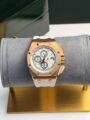 AP Royal Oak Rose Gold watch with white textured dial and white rubber strap