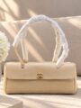 Chanel Beige Quilted Handbag with Cream Textured Finish and Gold Tone CC Logo