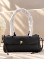 Chanel Black Caviar Bag with Elongated Flap Design Pebbled Black Exterior Gold CC Style Closure and Double Top Handles