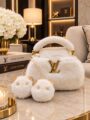 LV White Fur Handbag with fluffy white exterior, gold tone LV logo, matching fur handle and decorative accessories